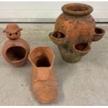 3 terracotta garden pots. A strawberry pot (approx. 36cm tall) together with a boot and snowman
