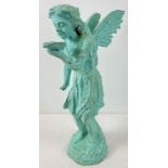 A vintage cast iron garden ornament modelled as a fairy drinking from a shell, painted green.