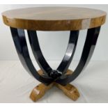 An Art Deco design circular shaped walnut veneer occasional table. With natural wood finish to top