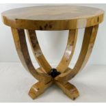 An Art Deco design circular shaped walnut veneer occasional table with polished finish. Slight