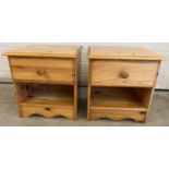 A pair of modern pine bedside cabinets with drawer and undershelf, shaped bottom and wooden knob