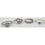 4 modern design stone set silver dress rings. A twist style band with bezel set small round