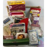A box of arts and craft making items, DVD's and books. To include card making kits, embroidery kit