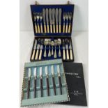 A vintage wooden canteen cutlery box containing original matching fish knives and forks, dessert