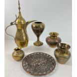 A collection of vintage Eastern brass items to include Islamic style coffee pot and Cairo ware