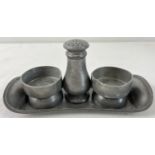 An early 20th century James Dixon & Sons pewter 4 piece cruet. Stamped to underside of tray and