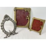 2 brass Art Nouveau style picture frames with figure and floral detail. Together with an oval