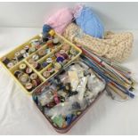 A box containing a collection of vintage haberdashery items. To include coloured cotton reels and
