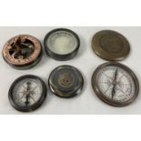 3 metal cased naval compasses. A large brass cased compass with screw top lid (approx. 8cm