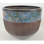 An antique bronze and champleve cloisonne planter with studded style textured central band.