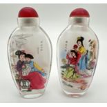 2 Oriental interior painted glass snuff/scent bottles with figural detail to both sides. Each
