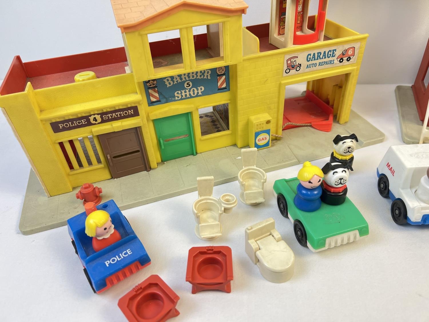 A vintage Fisher Price Family Play Village play set with accessories. To include cars, figures and - Image 2 of 4