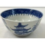 A Chinese ceramic blue & white tea bowl with hand painted scenic decoration to outer bowl. Wide