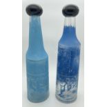 Two 1970's Salvador Dali for Rosso Antico aperitif bottles in blue tones, with serigraphic image.