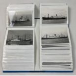 An album containing 99 assorted vintage postcards & photographs of ships and Liners to include The