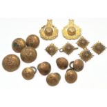 A collection of assorted vintage military badges and buttons. To include WWII Royal Army Medical