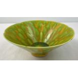 A Chinese ceramic bowl with yellow and green spotted design glaze and scalloped rim. Hand painted
