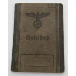 A WWII style German identity book for Peter Horst with photograph. Dated 1938. Possibly reproduction