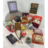 A box of misc. vintage and modern items. To include picture frames, fan, cut throat razor, miniature