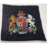 A vintage piece of needlepoint depicting the Arms of Dominion Royal Coat of Arms. Fabric approx.