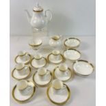 A quantity of Royal Doulton Georgian shape tea ware in classic 'Clarendon' pattern, with gilt