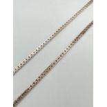 A silver 18" double box chain with spring ring clasp. Silver marks to fixings and clasp.