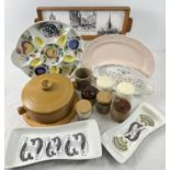 A box of ceramic kitchen and table ware. To include 2 handled casserole dish, ceramic tile serving