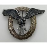 A WWII style German Luftwaffe Pilots badge with eagle and wreath detail. Marked B S W to back. Possi