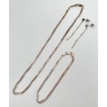 A silver bar and ball design necklace, with matching bracelet and drop earrings. Lobster claw clasps