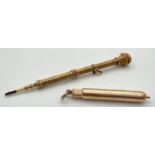 2 early 20th century unmarked gold cased propelling pencils, both test as 14ct gold. A Mabie