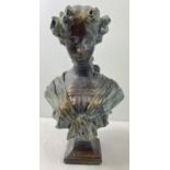 A large stoneware bust of a woman with a bronzed effect painted finish. Approx. 46cm tall and weighs