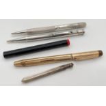 2 vintage silver cased propelling pencils together with a rolled gold pencil, a small white metal