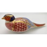 A Royal Crown Derby pheasant paperweight in Imari colourway with gilt detailing. Complete with