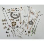 A collection of diamante and stone set modern and vintage jewellery. To include earrings, necklaces,