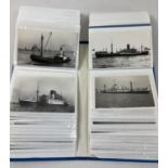 An album containing 98 vintage mostly black & white postcards & photographs of ships to include