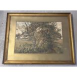 A framed and glazed watercolour of trees by a riverside, unsigned. Frame size approx. 55 x 70cm.