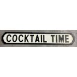 A modern painted wood 'Cocktail Time' sign, in the style of an old street sign. Approx. 84cm long.