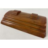 An Art Deco Carvacraft butterscotch bakelite desk standish with inkwells for black & red ink.