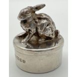 A novelty silver pill box with lid modelled as a rabbit. Fully hallmarked for London 1994 with WW