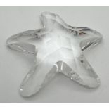 A Swarovski crystal starfish, complete with box. Swan mark to back. Approx. 5.5 x 6cm.