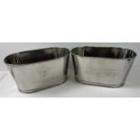 A pair of oval shaped Bollinger Champagne buckets with engraved details to sides. One side is