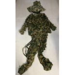 A 3 piece military woodland camouflage Ghillie suit. Comprising helmet and head cover, jacket/top