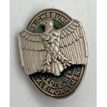 A World War II style German State For Gardeners pin badge depicting an eagle on an oval backgound.