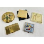 4 vintage compacts together with a folding handbag mirror. Compacts include Swiss Agme gold tone
