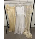 3 vintage wedding dresses. A vintage 1970's lace layered dress with angel sleeves and high neck,