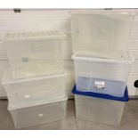 6 large lidded plastic tubs - 4 x 80 litre tubs and 2 x 69 litres tubs.