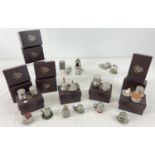 A collection of 20 pewter Thimble Collectors Club novelty thimbles, some boxed. Each thimble with