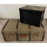 A vintage wooden bound travelling trunk together with a small pine tool box painted black.