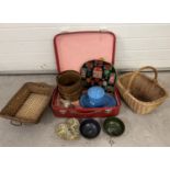 A vintage suitcase containing a selection of vintage misc items. To include enamel ware, papier