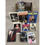 A box of books relating to film stars, movies and Elvis. To include Elvis Now & Then Official